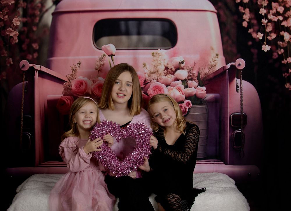 A series of pink-tinted photos showing joyful moments and floral arrangements in a dreamy, romantic setting.