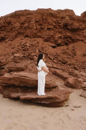 Maternity photos taken cliffside