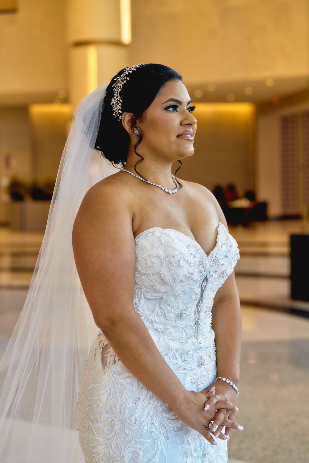 Beautiful wedding dress detail shots showcasing intricate lace patterns and beading.