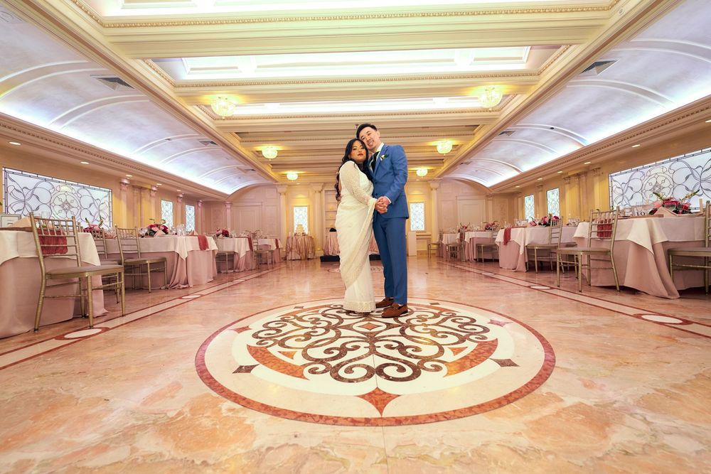 A luxurious ballroom with ornate marble flooring and intricate ceiling details. at Jericho Terrace