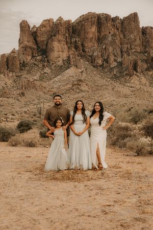 Outdoor family portraits featuring warm golden hour lighting in Arizona.