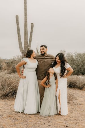 Emotional family portraits captured outdoors in the Phoenix desert.