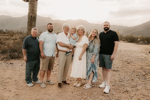 Natural family moments captured during an outdoor session in Buckeye Arizona.
