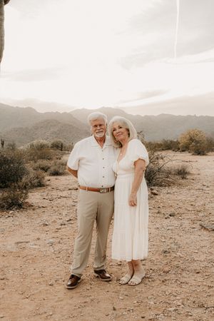 Family laughing together during a natural light session in Arizona.
