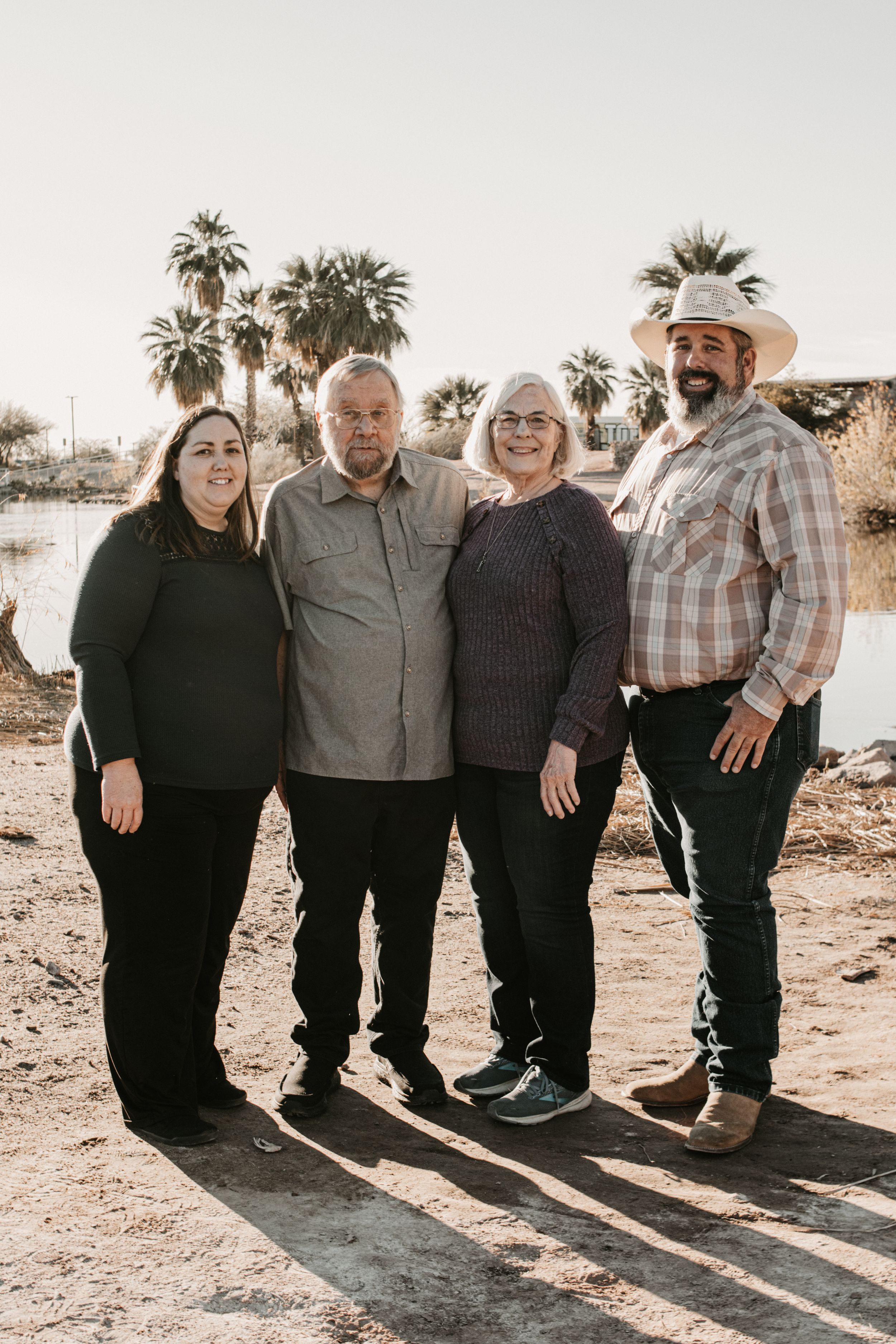 Outdoor family portraits captured in the Arizona desert during golden hour.