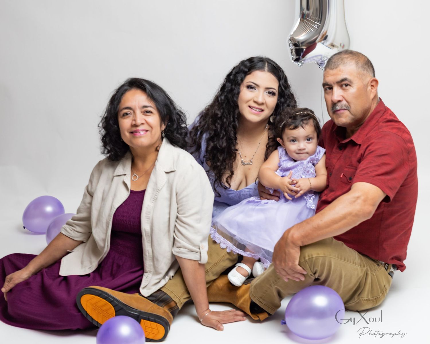 A series of family photo poses with purple balloons on a white background showing casual and playful interactions.