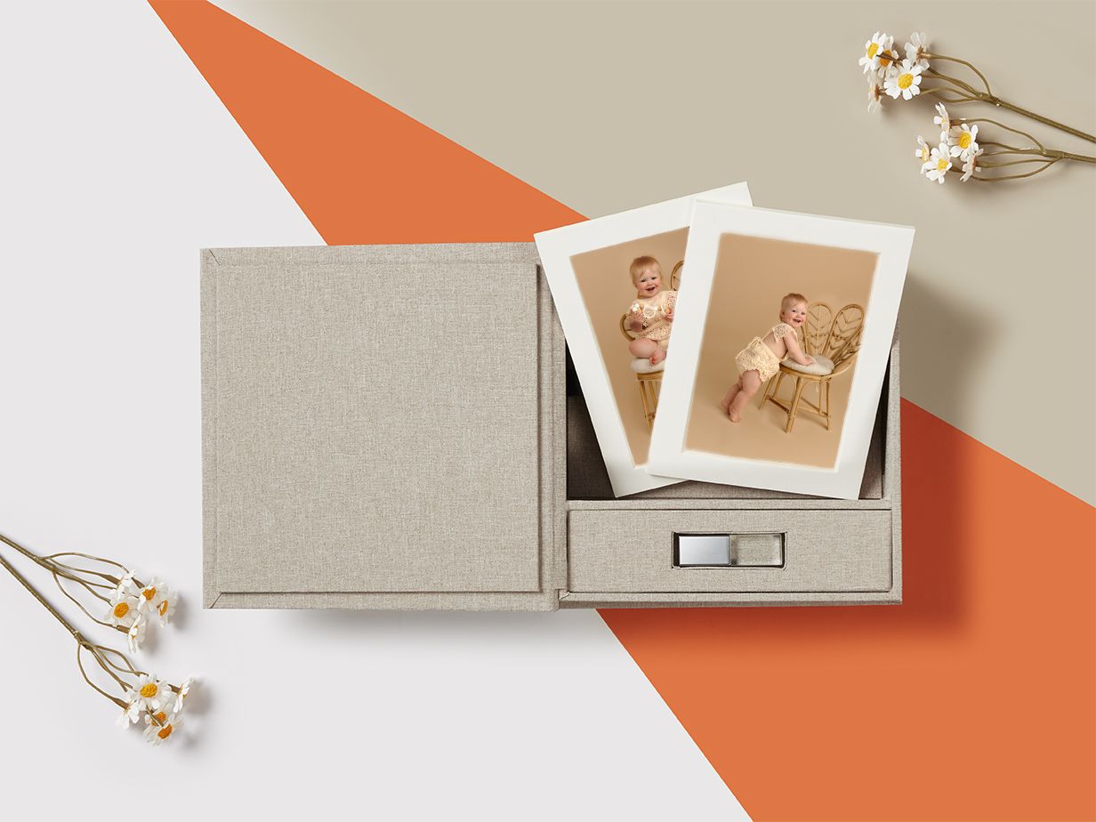Fine art box with matted photos and usb of baby girl, available through Somerset Portraits, a photography studio in Charlottesville.