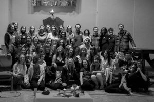 Large group photo of people gathered together in black and white for a special occasion.