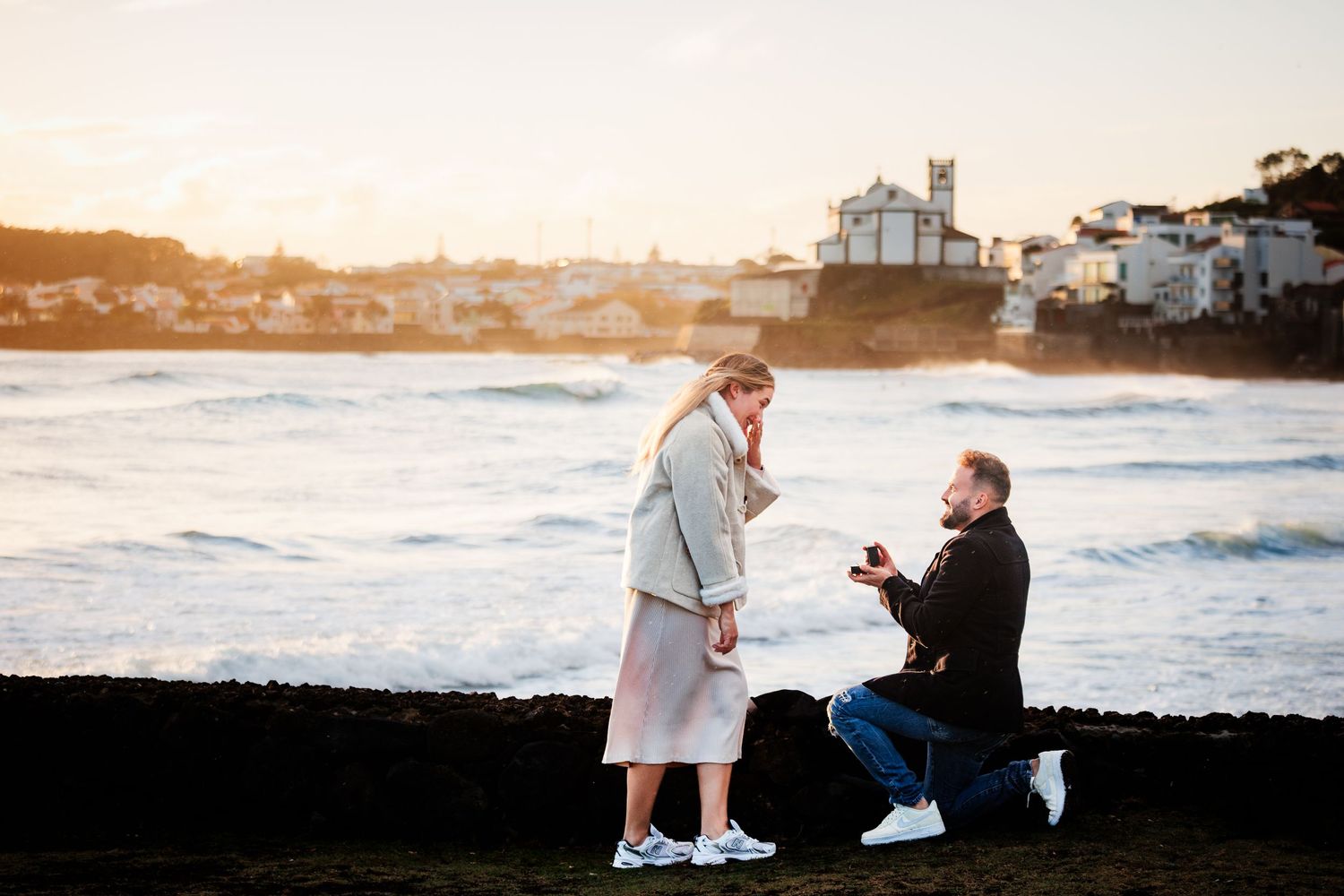 Romantic marriage proposal by the Atlantic ocean, at São Miguel island, Azores.