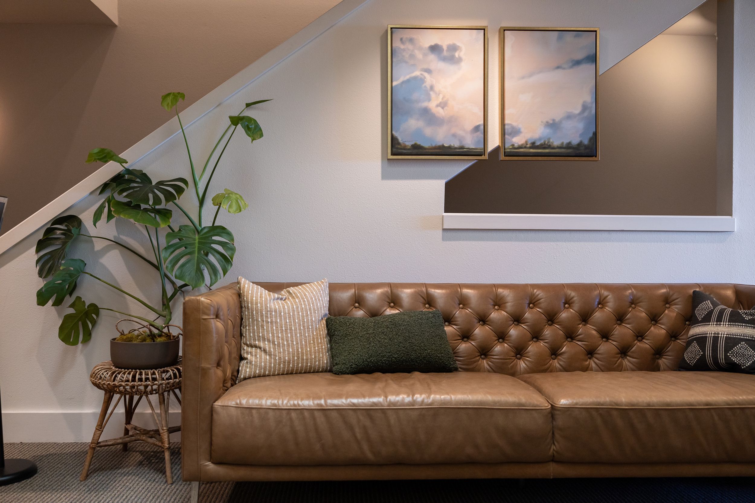 Woman business owner Talks Over Tea Mental Health Therapist in Tacoma, WA personal branding  office waiting room area couch