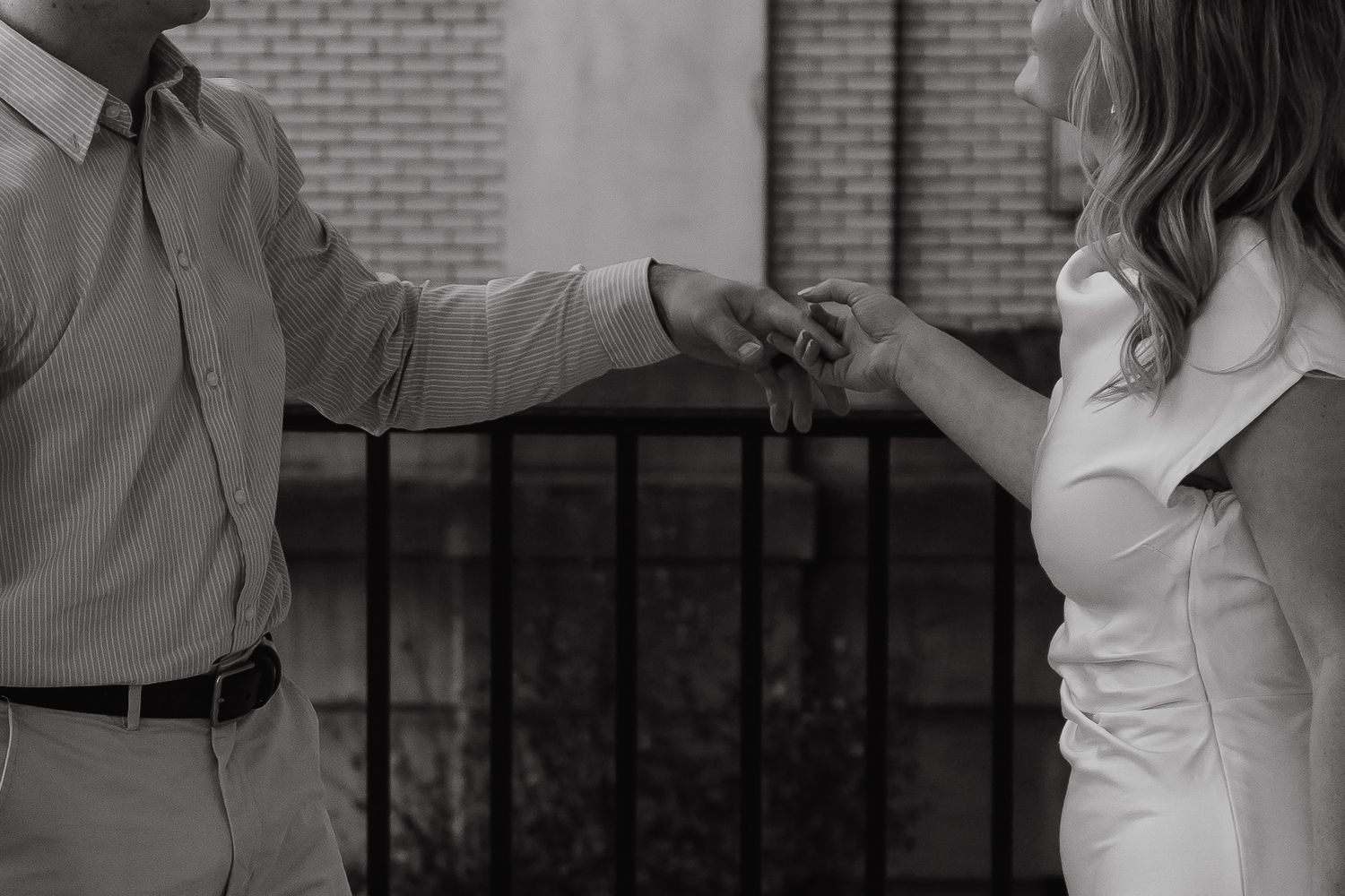 Bride and Groom holding hands softly at City Hall