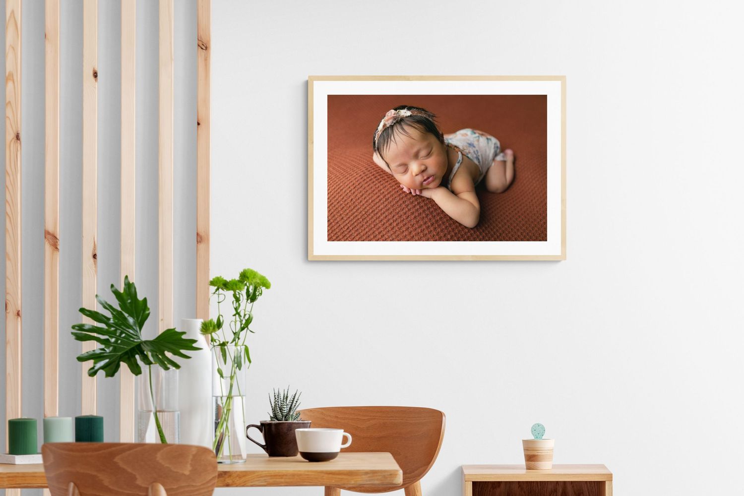 Orlando FL newborn  Photography, Framed photo on the wall of a sleeping baby in a cute lace romper