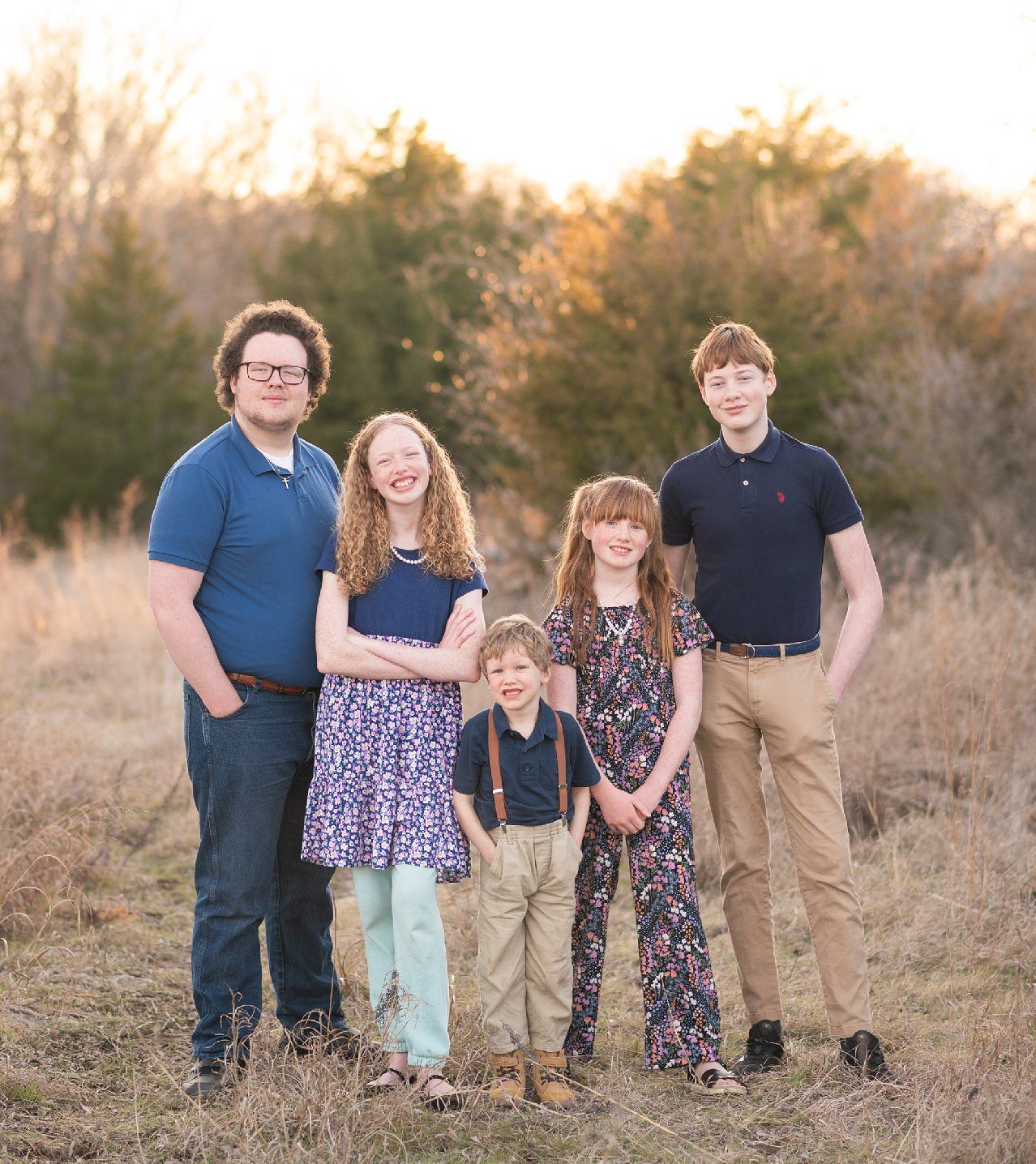 Family of 6 Late Winter Session in Field of Evergreens by Bartlesville Family Photographer Kristi Bray