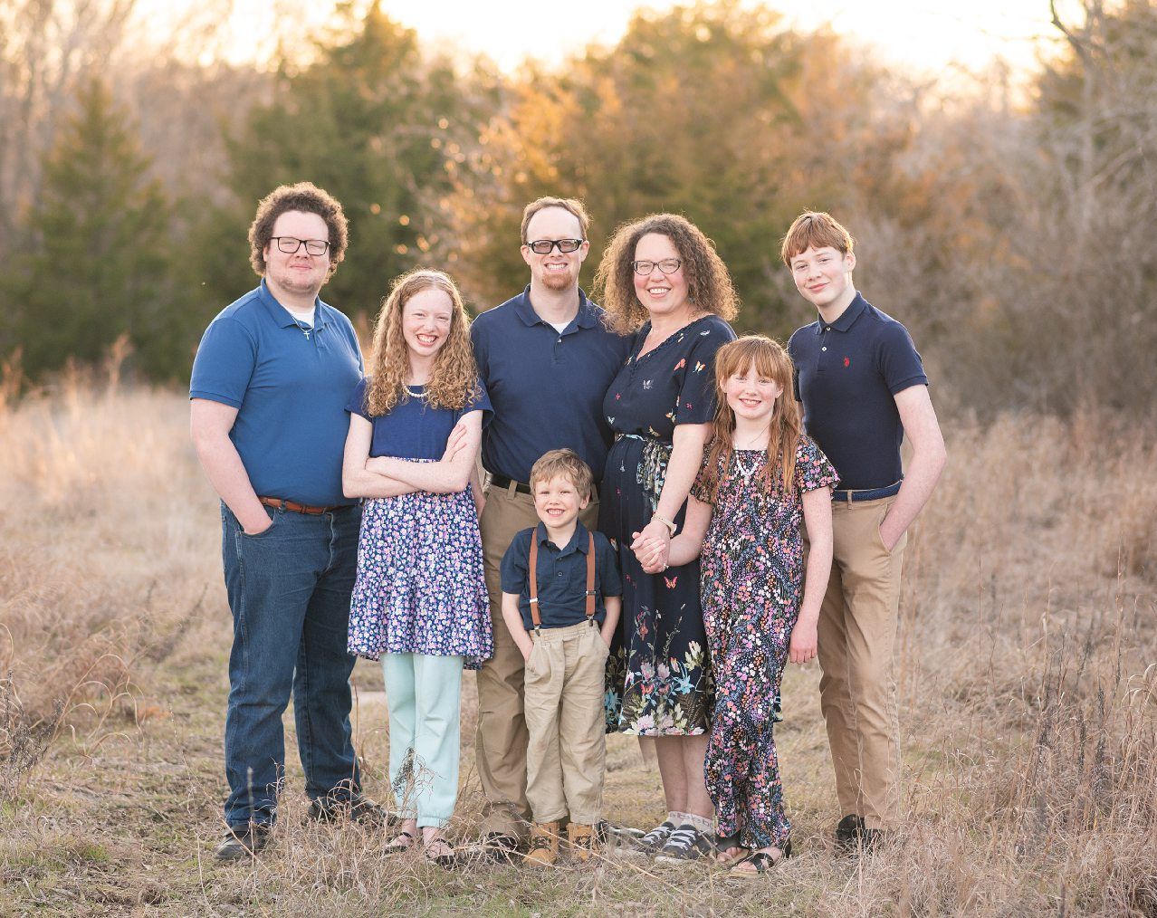 Family of 6 Late Winter Session in Field of Evergreens by Bartlesville Family Photographer Kristi Bray