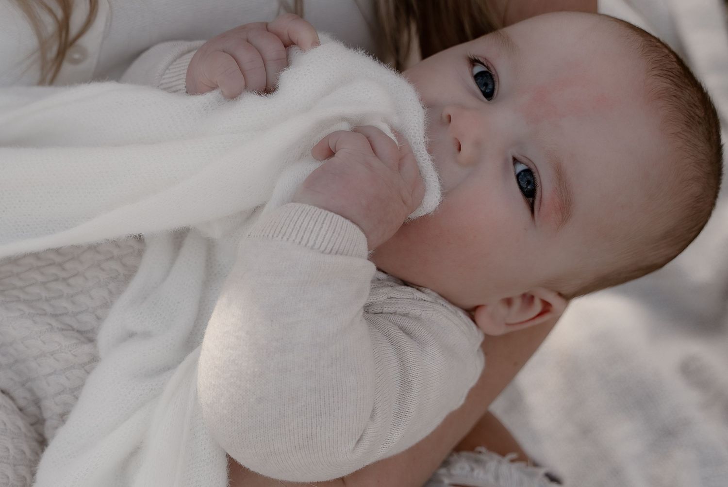 intimate-motherhood-photography-swaddle-and-snuggles.jpg