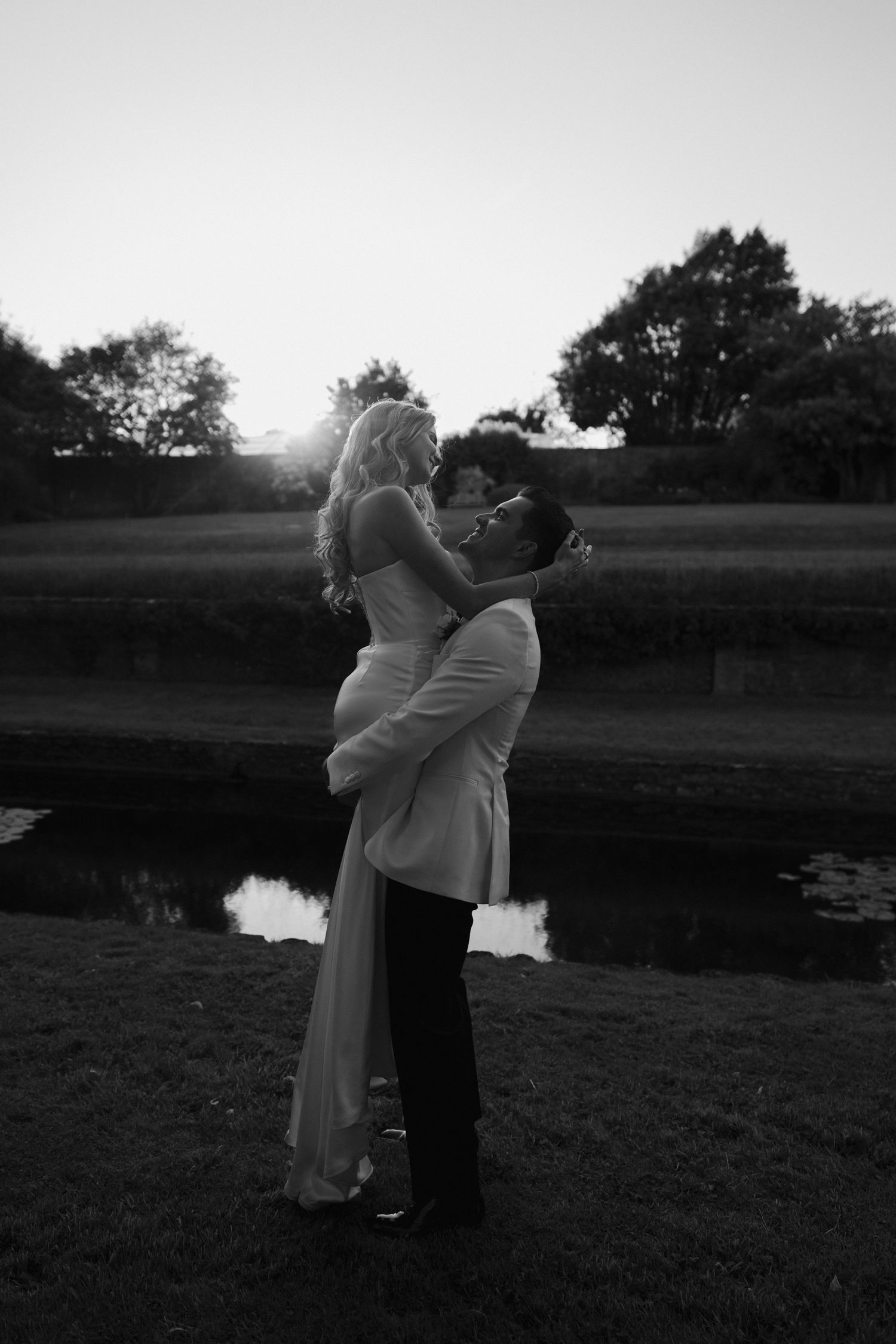groom lifting bride at hamswell house in bath