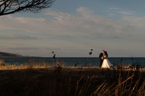 A series of scenic coastal landscape photos showing beach dunes, ocean views, and natural vegetation at sunset.