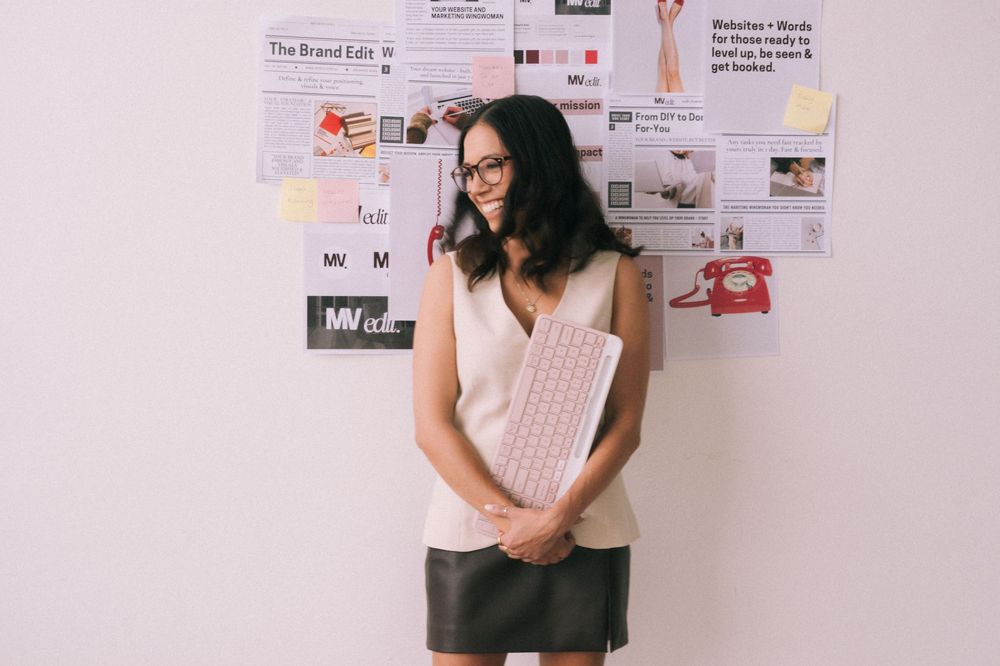 A collection of lifestyle photos showing a person in casual outfits against a white wall with framed artwork.