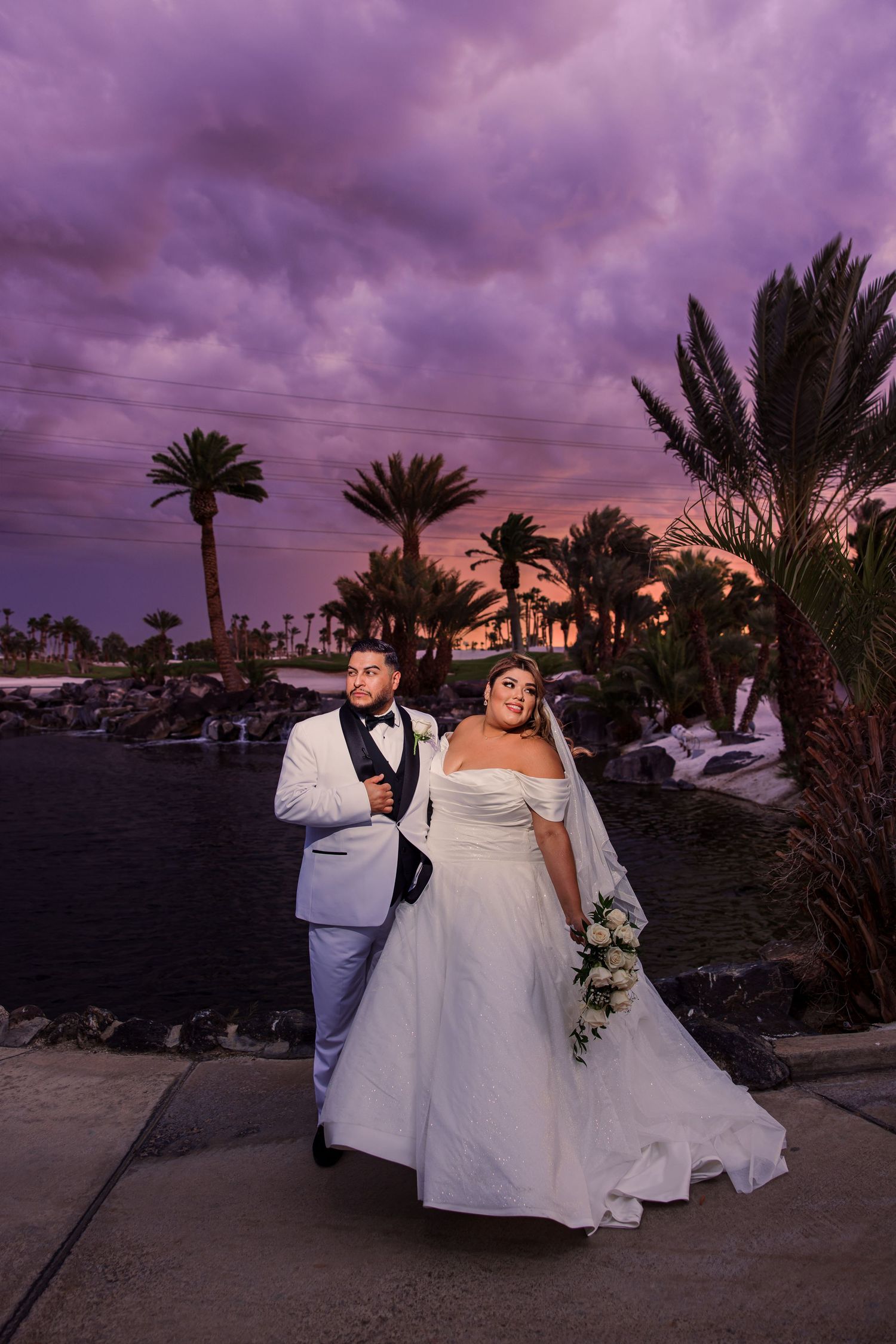 bride and groom portraits at DragonRidge Country Club sunset