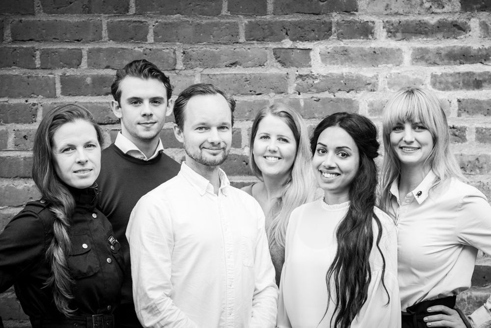 Porträttfotograf i Stockholm. Photo By Anna Jarlhäll. Företagsporträtt. Gruppbild.
