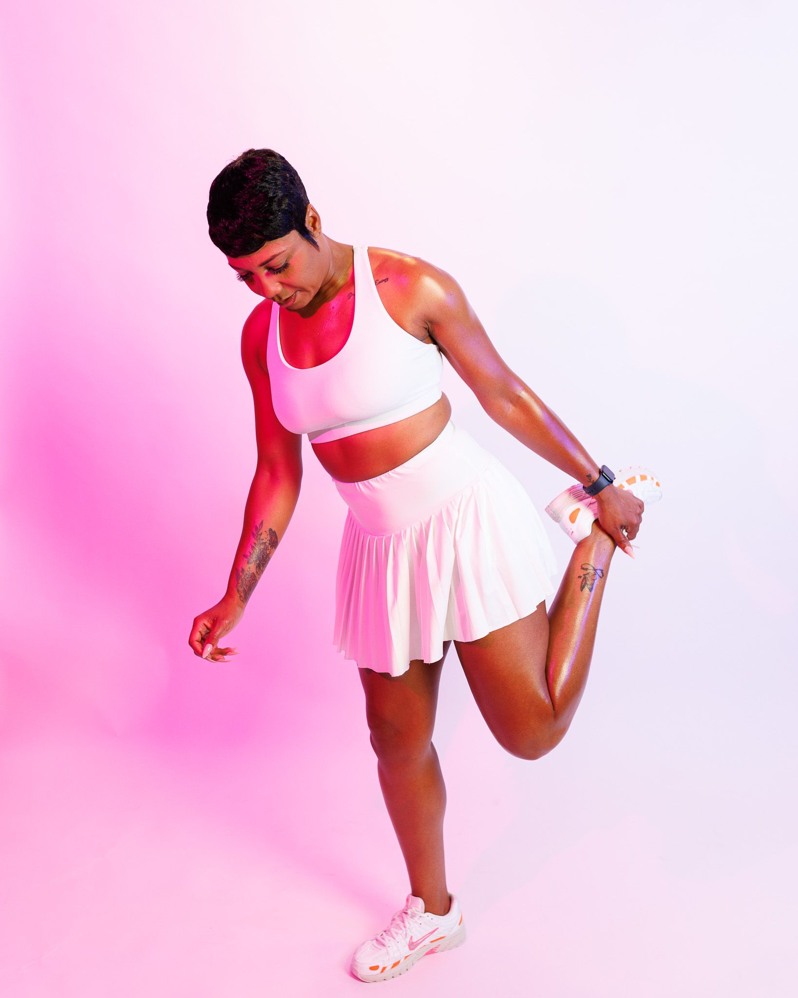 A sequence of four action shots showing a person in white athletic wear performing dynamic dance movements.