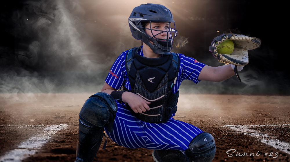 Baseball catcher in protective gear crouches in dramatic lighting and smoke.