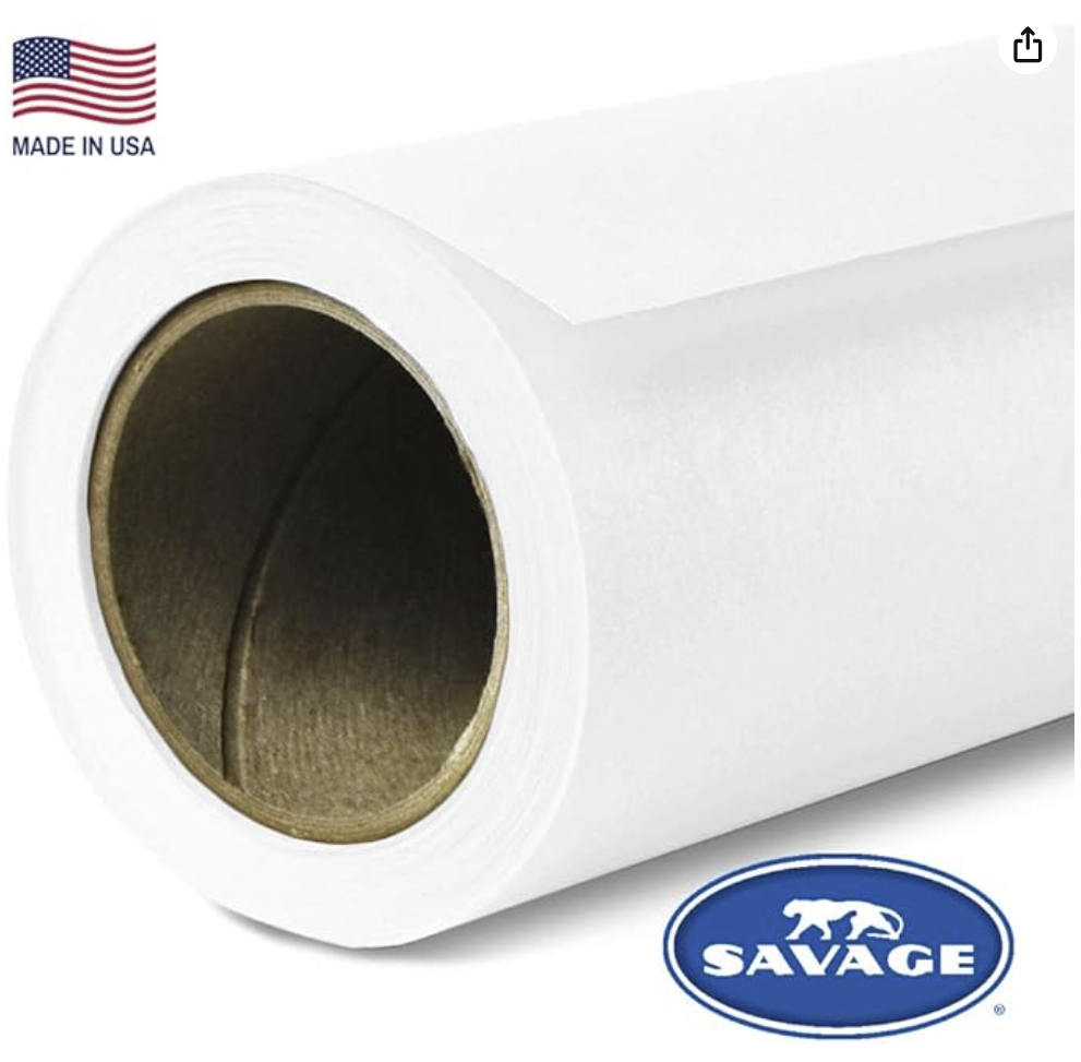 White seamless paper background roll with Made in USA label and Savage brand logo against light gray backdrop.
