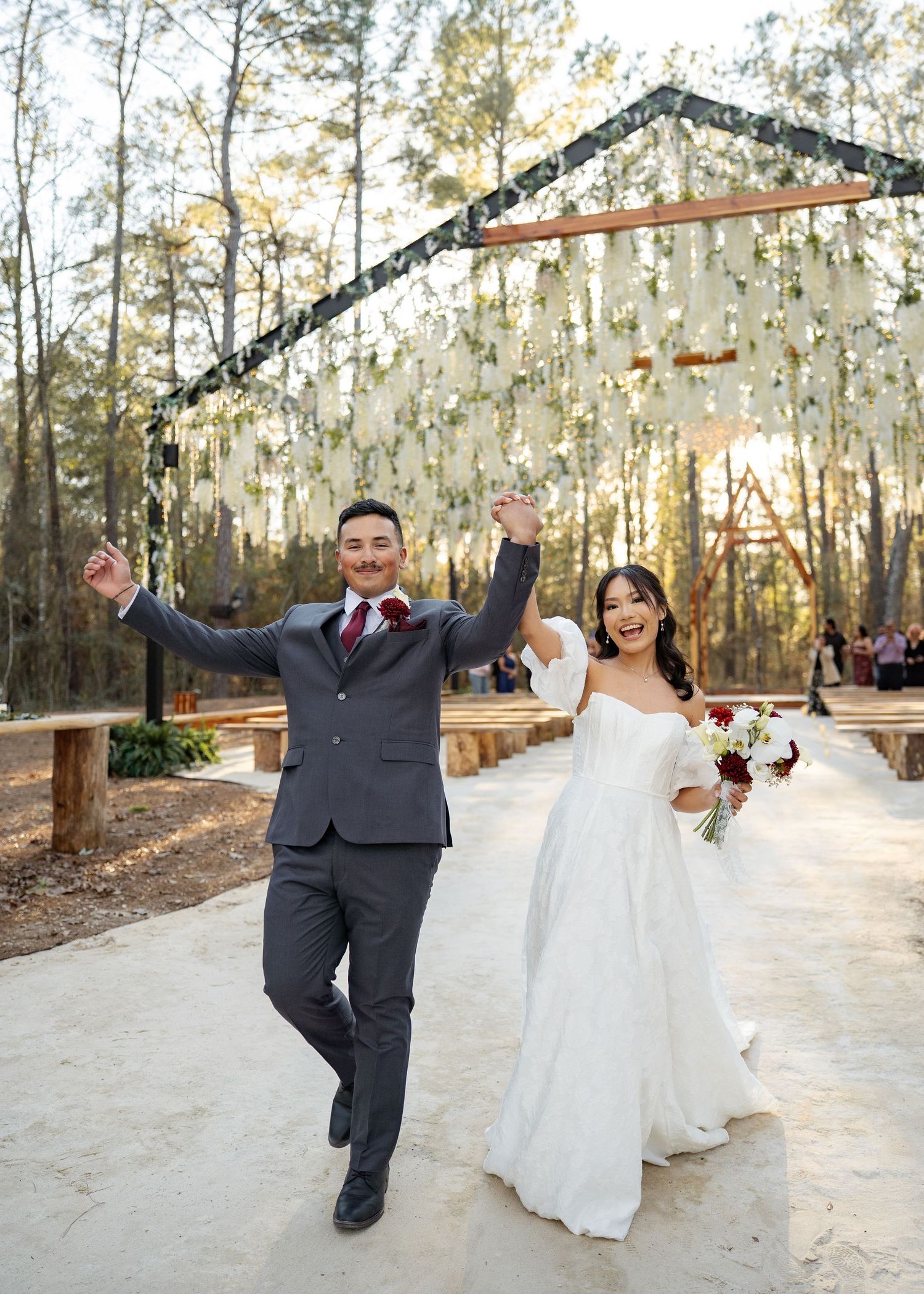 Twilight elopement ceremony of the Barrillas Family in Montgomery TX, with warm, moody light