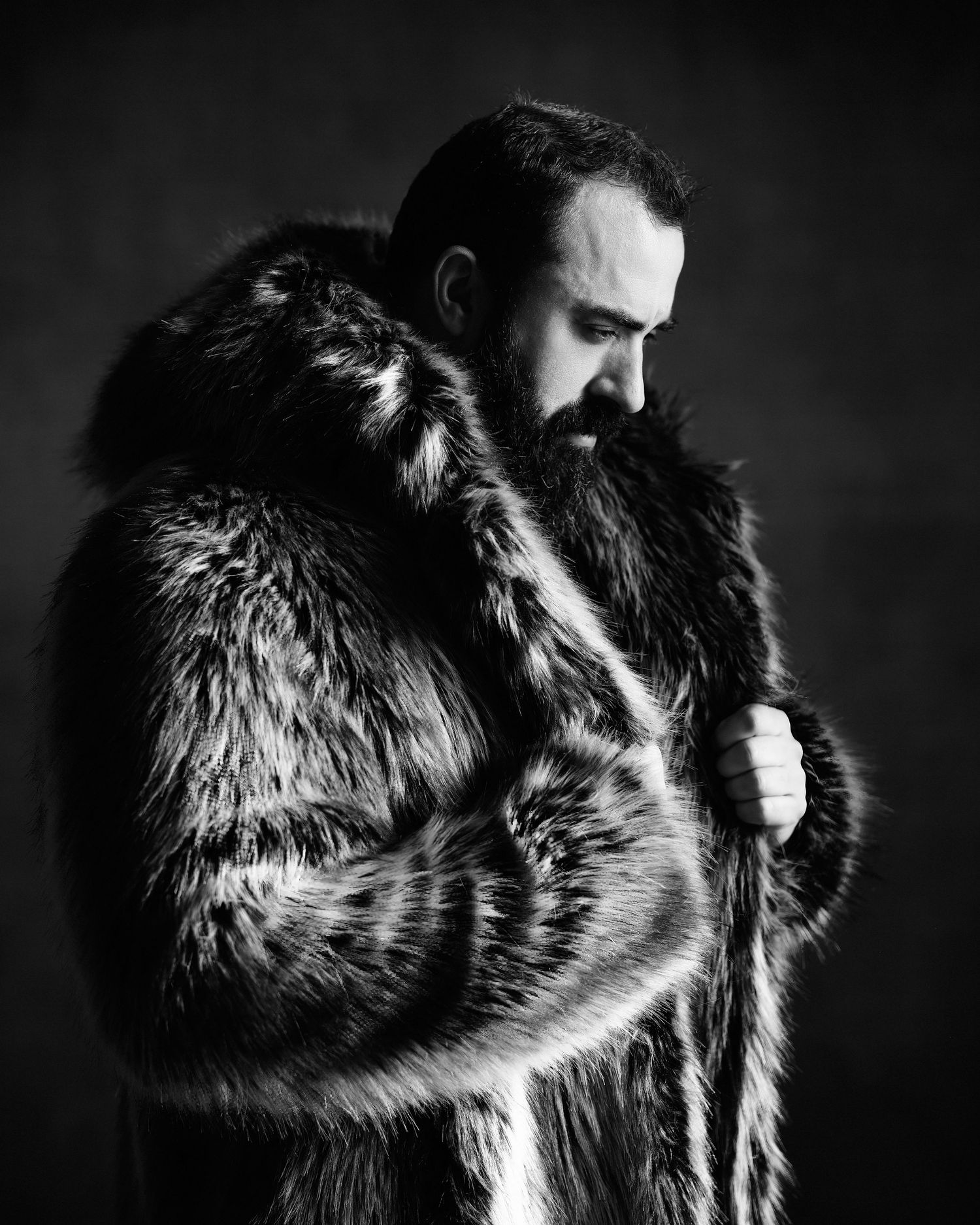 David G Holt Photography - Dramatic black and white portrait of textured fur coat.