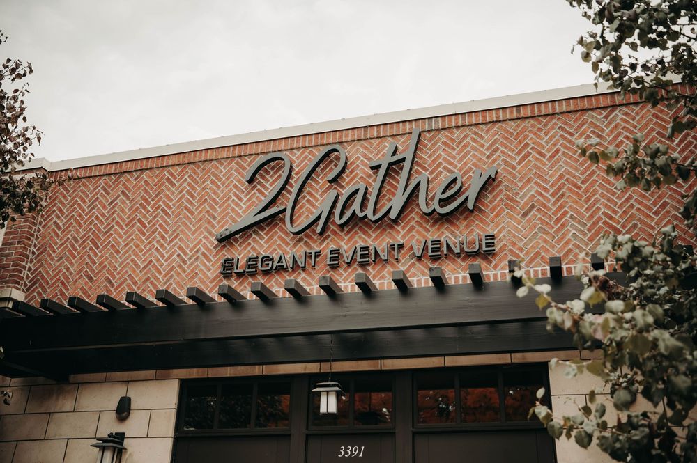 2Gather Elegant Event Venue exterior with brick herringbone facade and signage at address 3391.