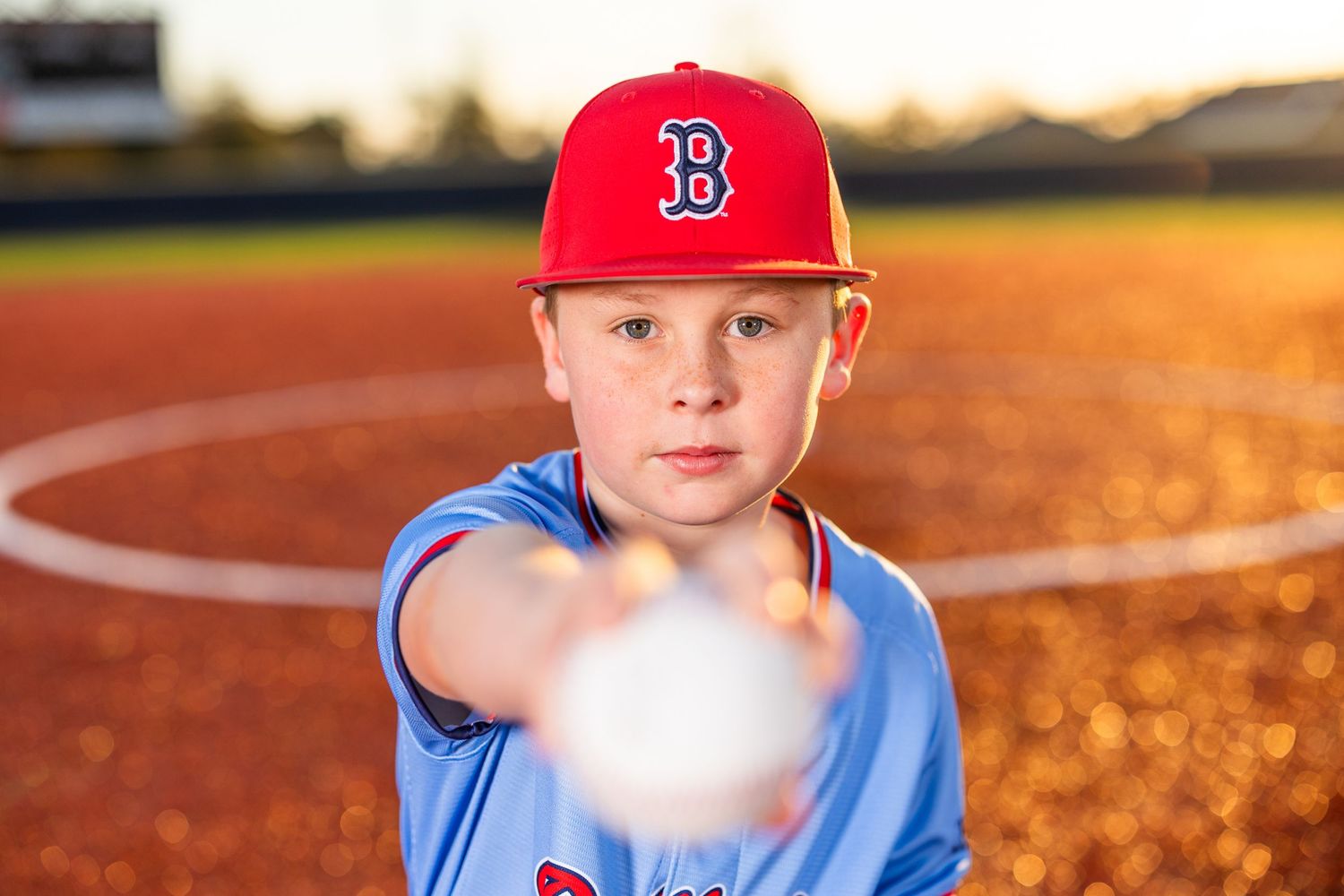 Youth baseball portrait using off-camera flash during a team media day in Lake Charles, LA. Ballistics at Westlake High School Field