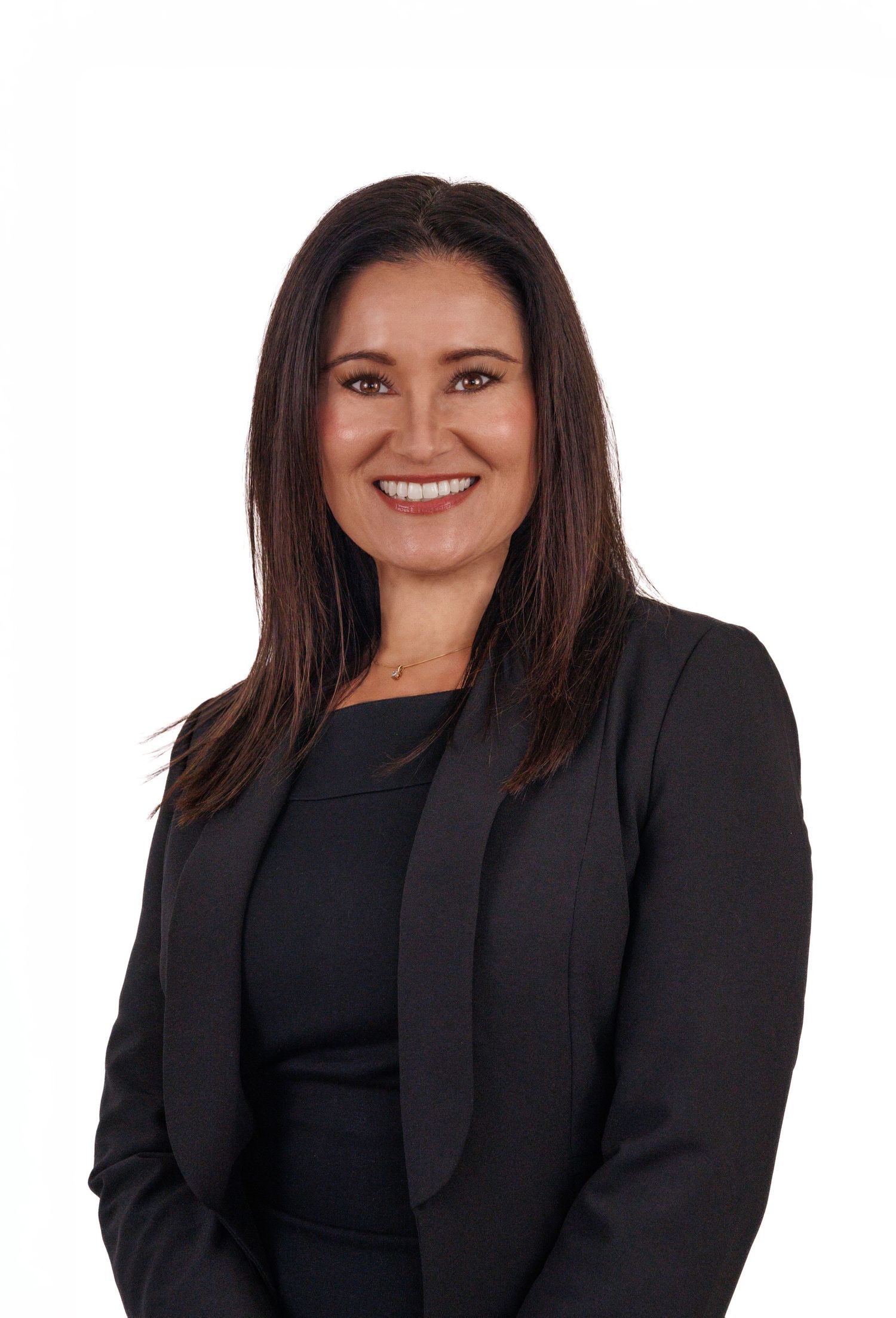 Corporate headshot of real estate agent on white background, professional and polished, photographed by Jems Photography