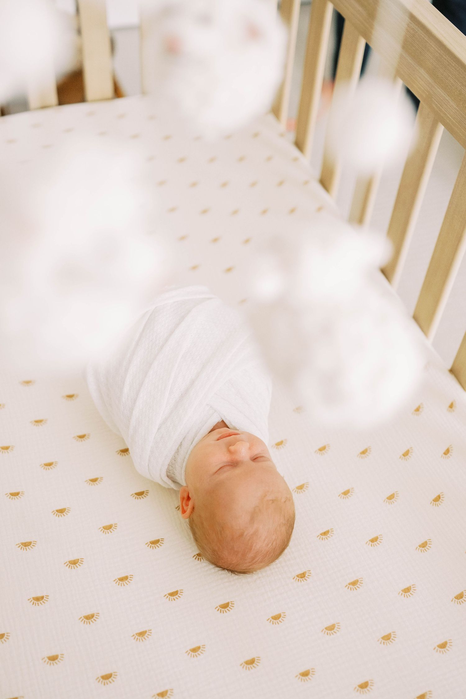Newborn portraits during lifestyle session is Frisco, TX