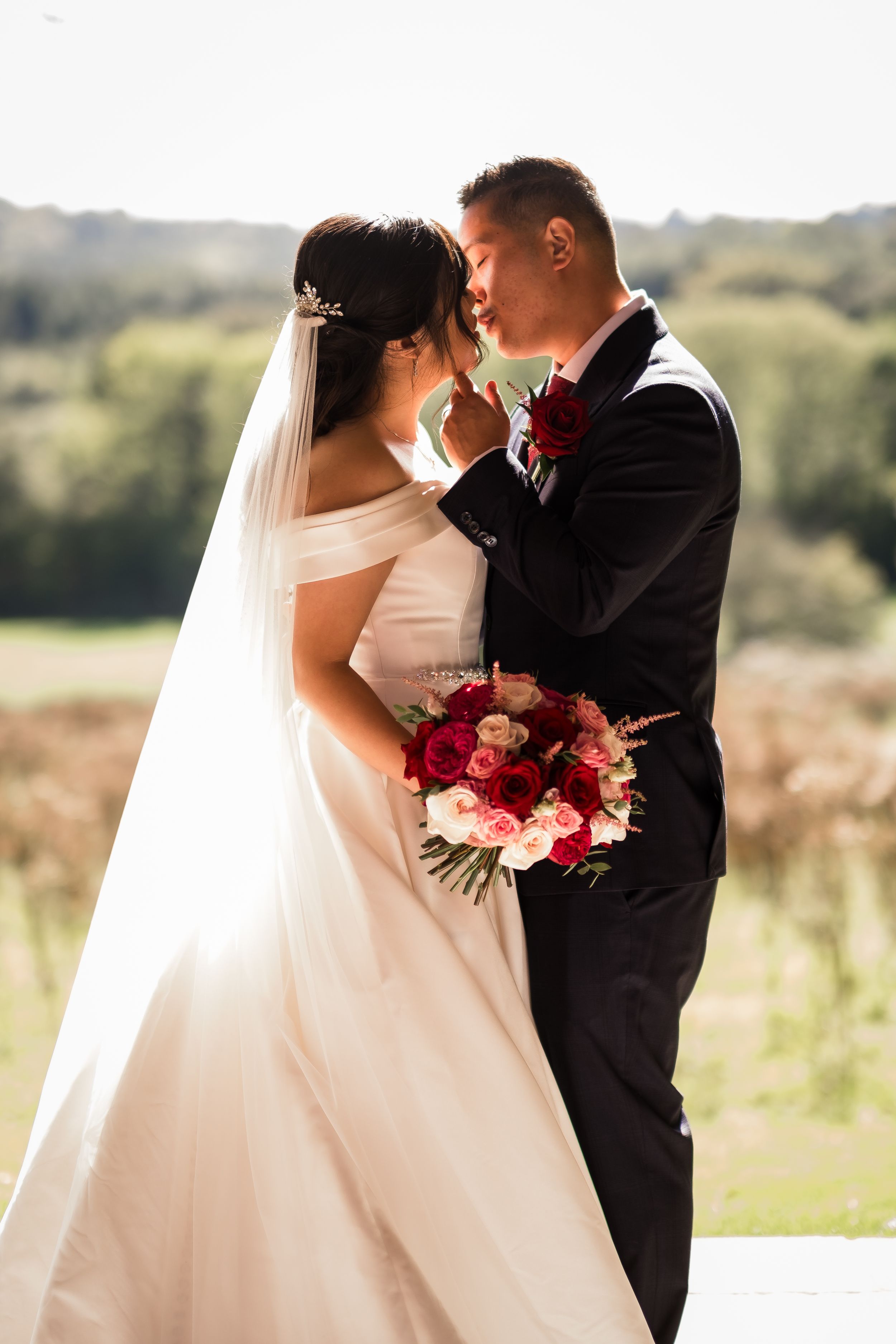 A romantic wedding photo sequence showing a couple in formal attire embracing against a scenic outdoor backdrop.