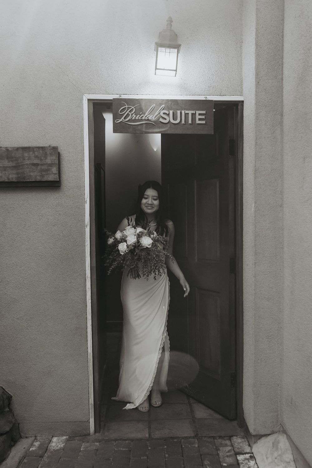 A black and white photo sequence showing a bride in entering through a door marked 'Bridal Suite' Inn of the Seventh Ray in Topanga.