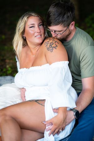 Casual outdoor portrait session with white off-shoulder dress.