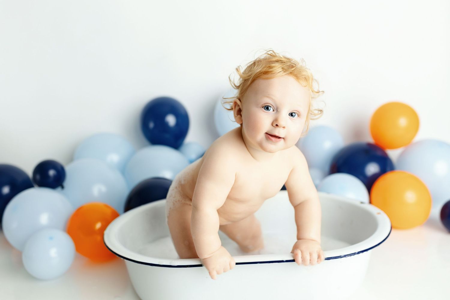 A boy standing in a tub. Greenville sc newborn photographer, Easley sc newborn photographer, Greenville sc newborn photos