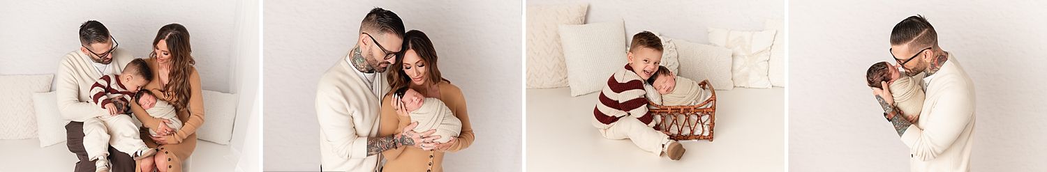 A family poses tenderly with their newborn baby in a bright white photography studio setting.