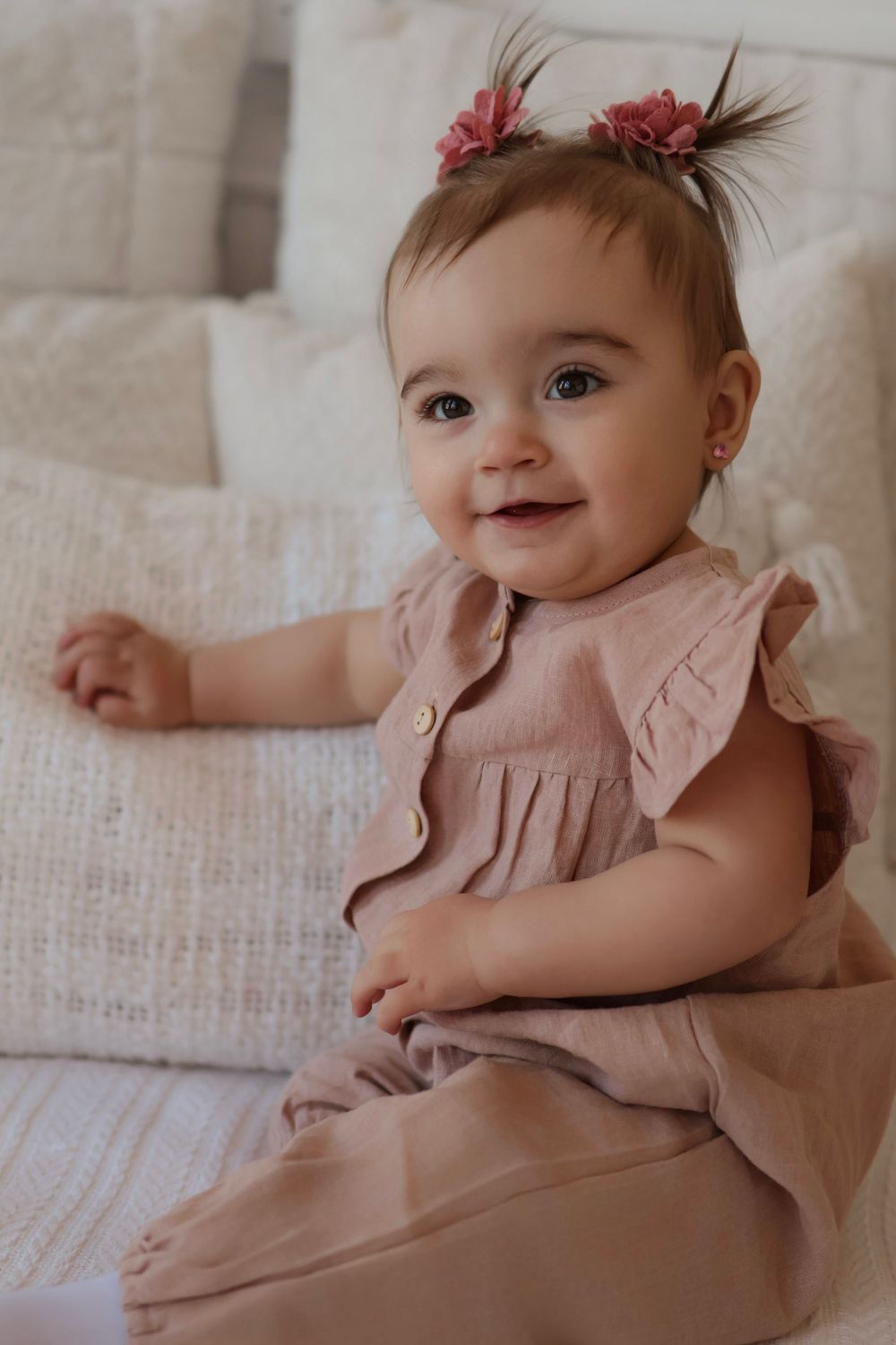 Sweet smiles and expressions in a series of close-up portraits wearing dusty rose.