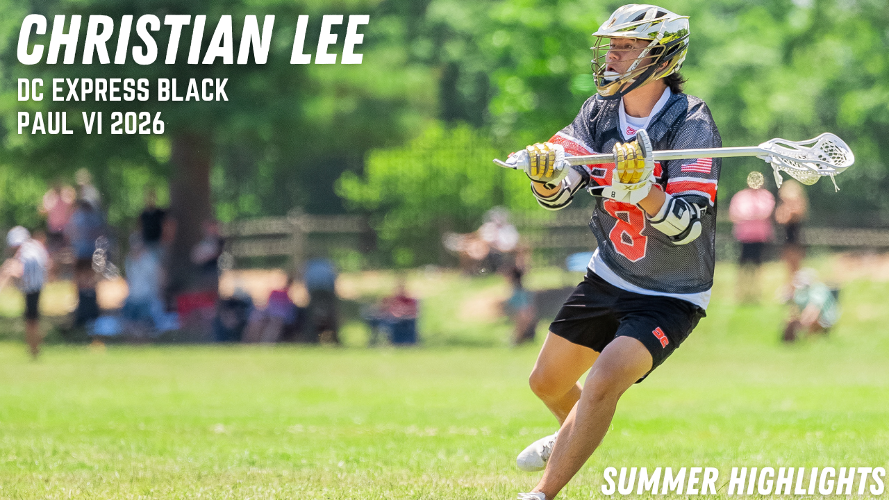 Lacrosse player in protective gear makes a play during a summer tournament match.