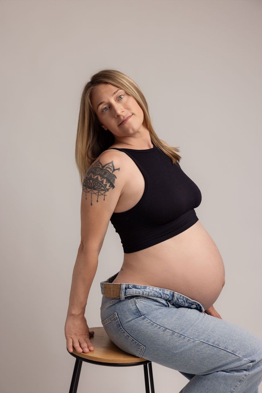 Timeless maternity portrait of a mother-to-be in a North Auckland photography studio
