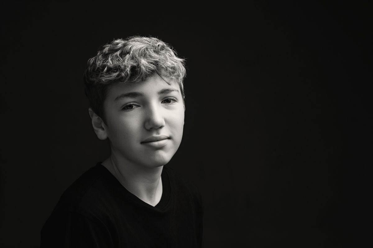 Teen boy fine art black and white, tight crop