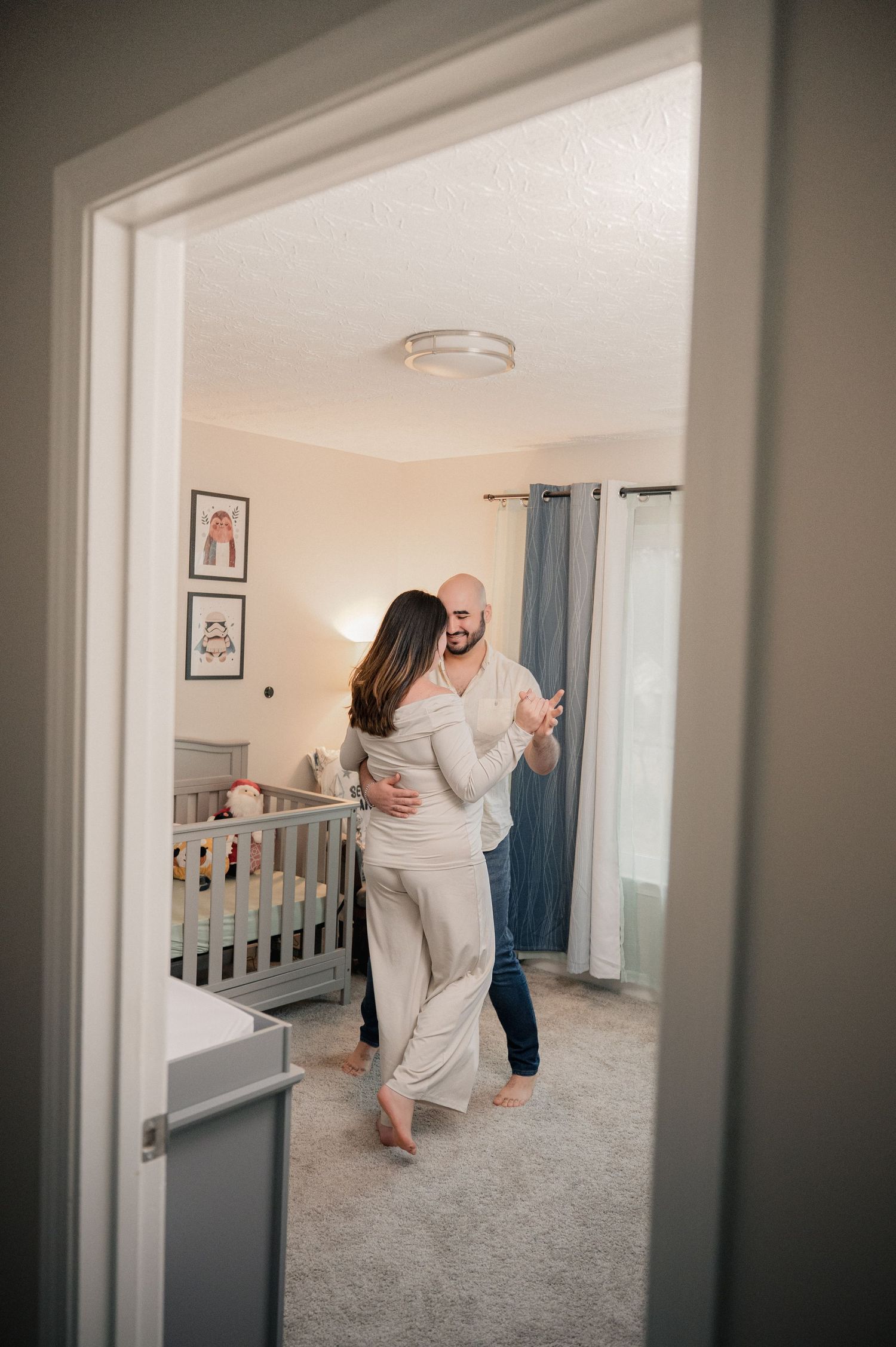 A sequence of dance moves captured in a home interior with white walls and carpeting.