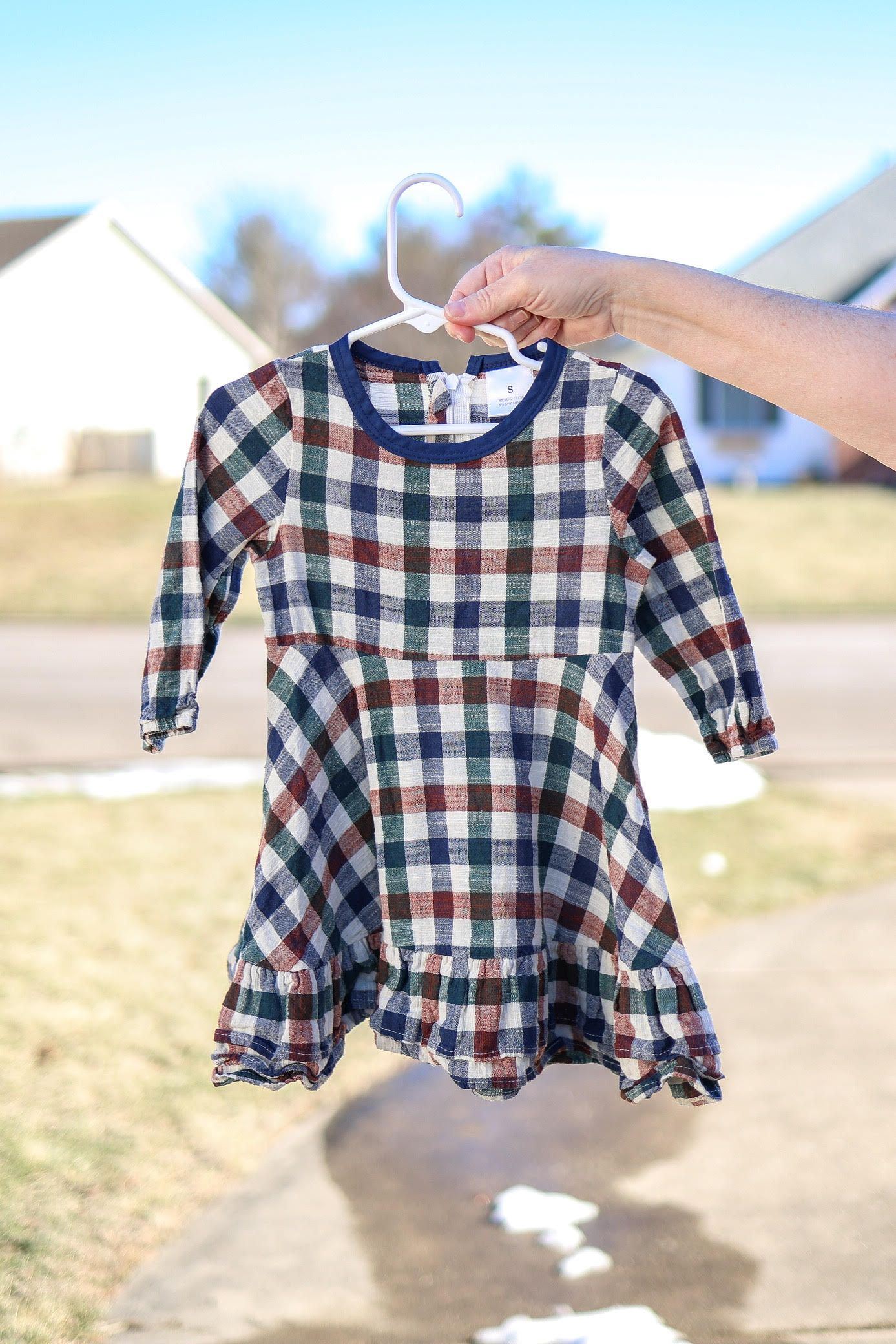 Central IL family photographer's client closet features a fall plaid dress