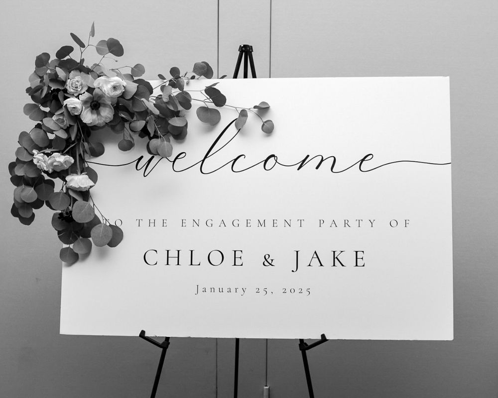 Elegant engagement party welcome sign with eucalyptus decor in black and white during engagement party in Westborough, MA. Event Photos