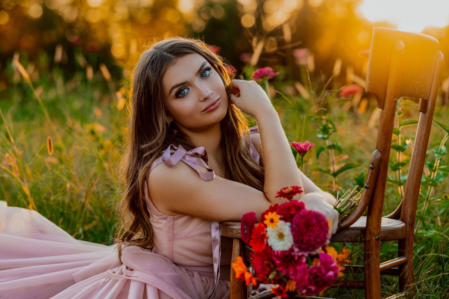 High school senior photos in Kansas captured at sunset with warm lighting