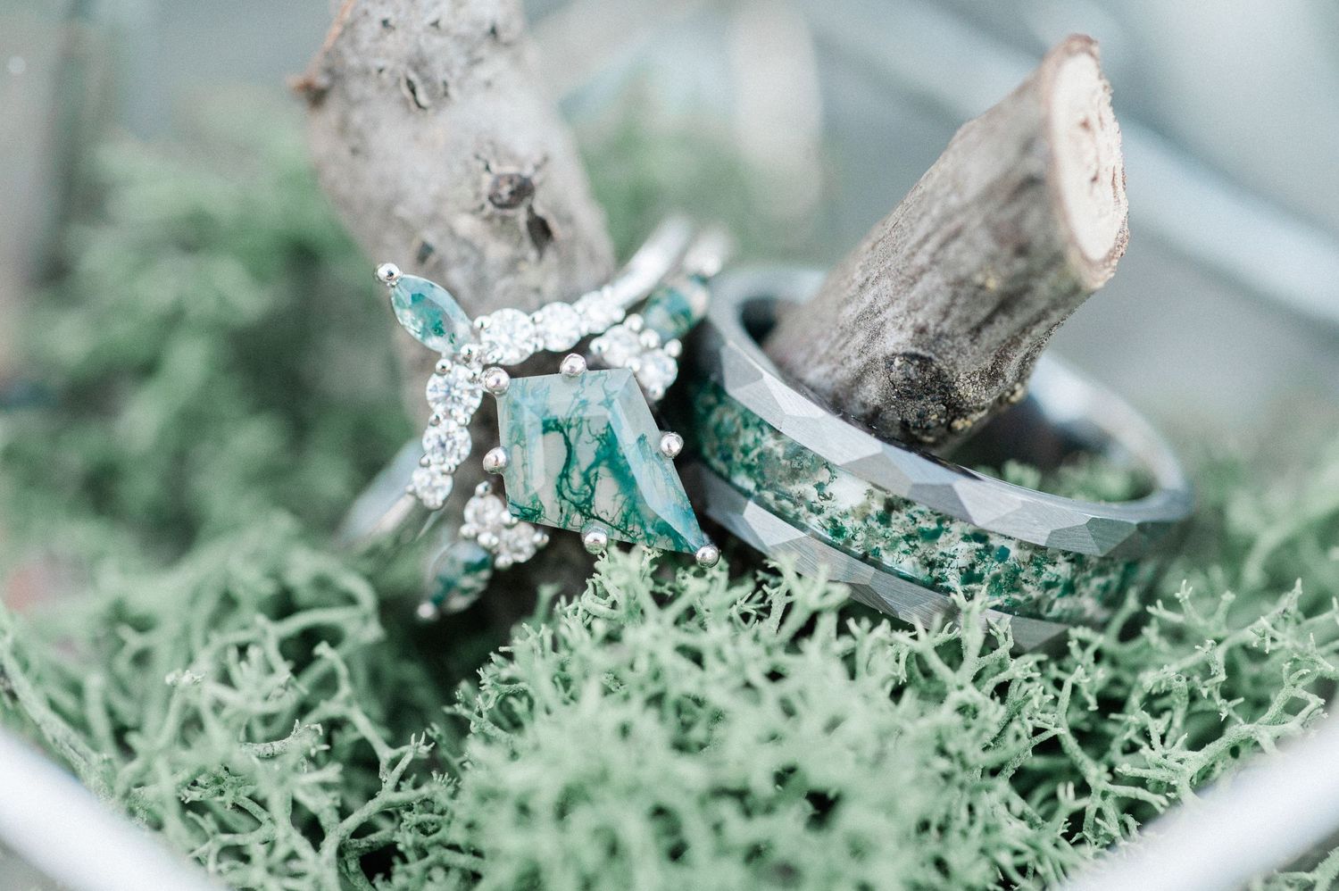 couple's wedding rings inspired by moss