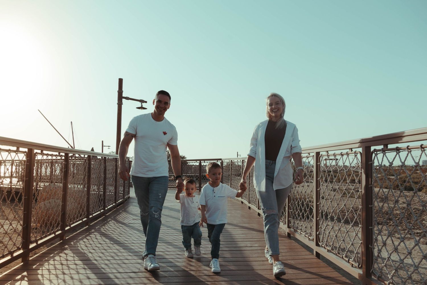 Family photo of The Gerbers as they walk at the beachside.