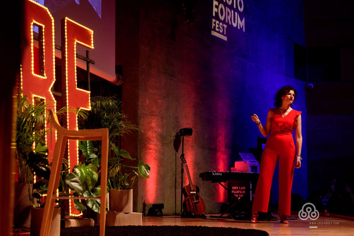 A collage of event photos showing stage presentations and conference settings with red and blue lighting effects.