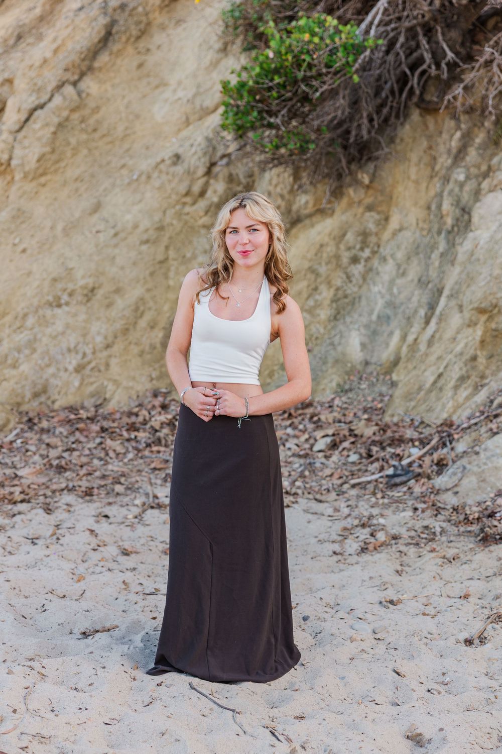 Outdoor graduation portraits of a Royal High School graduate at Leo Carrillo State Beach, Los Angeles County.